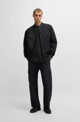 Camiseta oversize fit para todos los géneros en algodón con etiqueta con logo