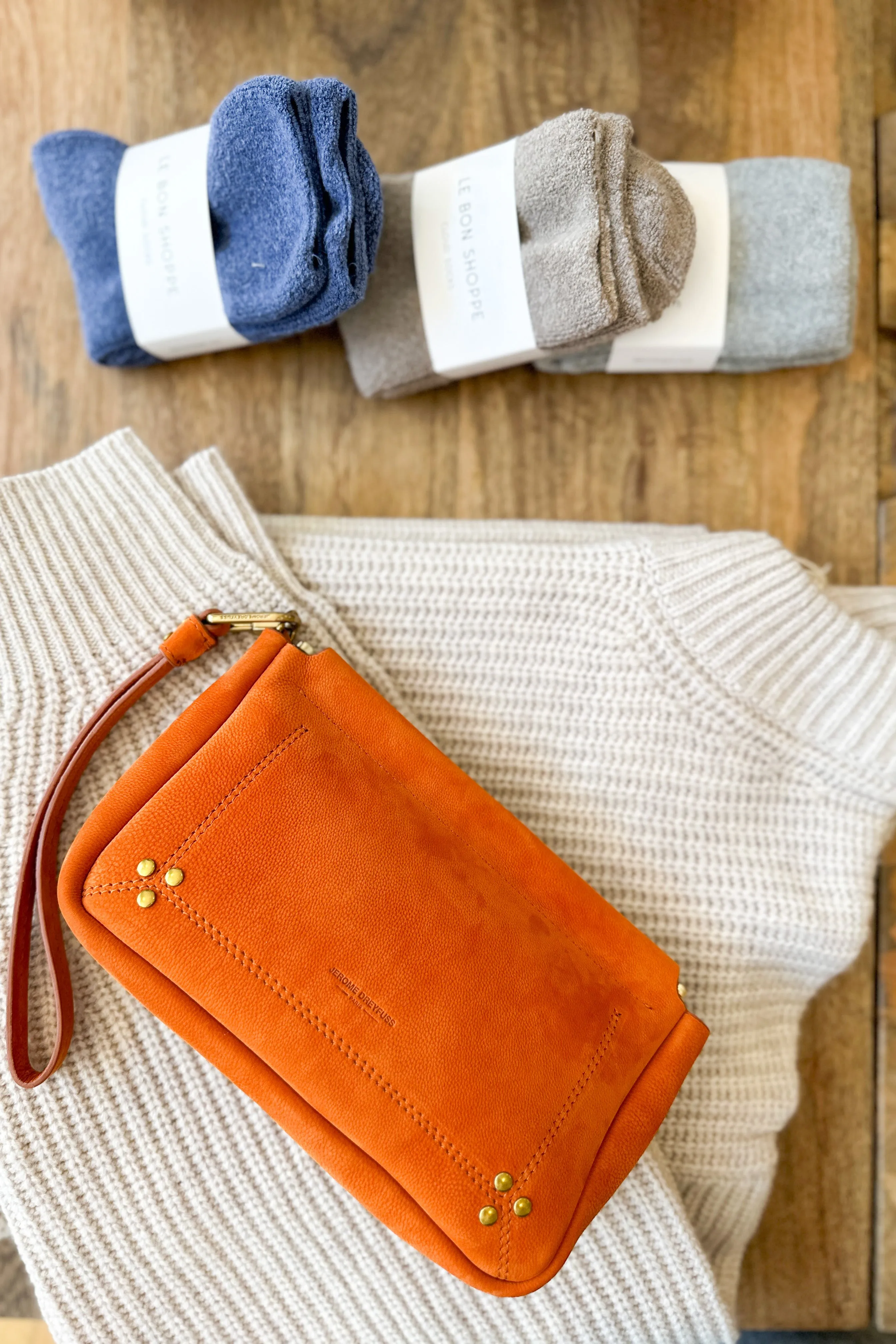 Clap L Wristlet in Nub Orange