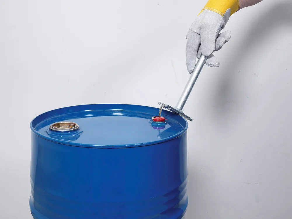 Llave combinada para roscas y tapones de bidones