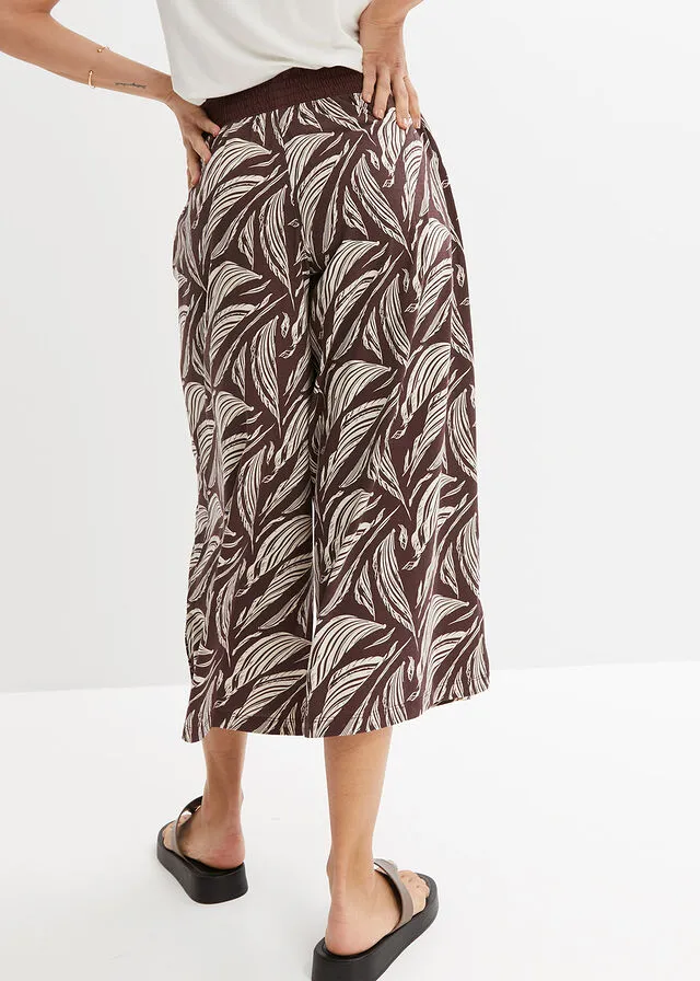 PANTALóN DE PUNTO ANCHO CON NIDO DE ABEJA MARRóN TIERRABEIGE ARENA CON ESTAMPADO