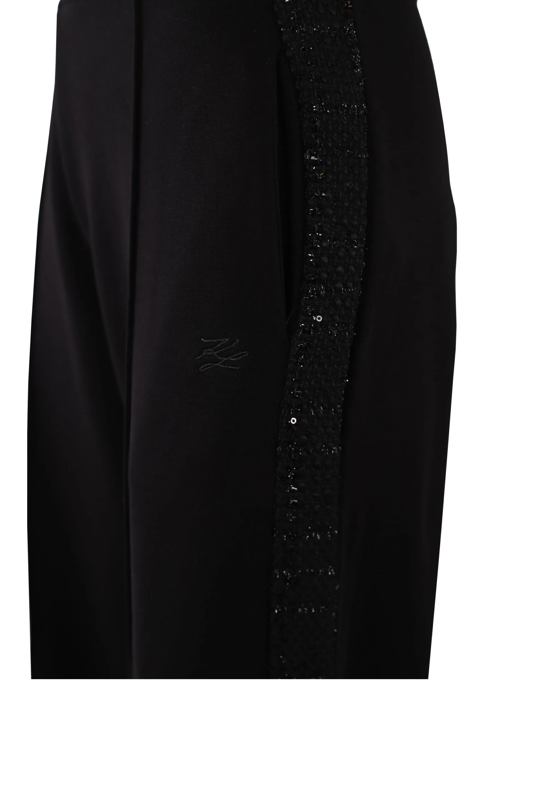 Pantalón negro con cinta de bouclé