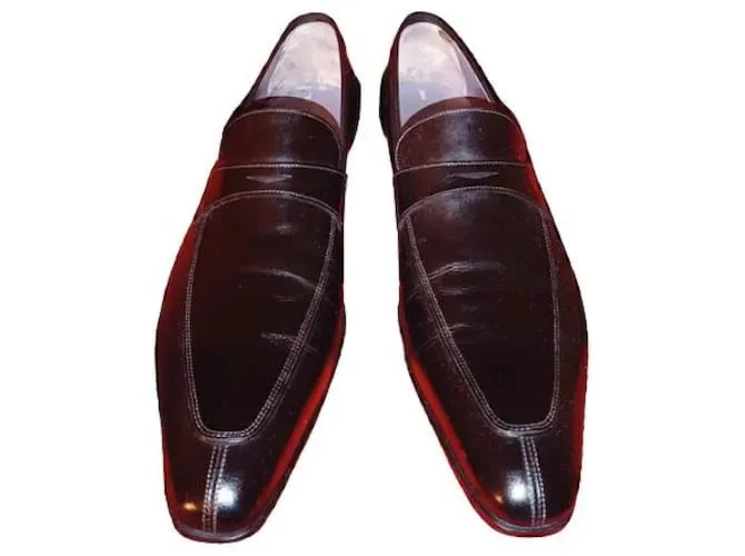 Santoni Mocasín Penny en piel color negro para hombre 