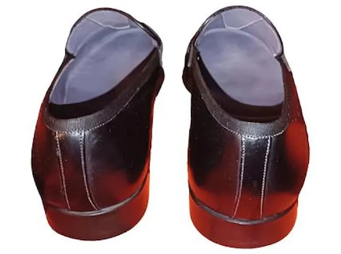 Santoni Mocasín Penny en piel color negro para hombre 